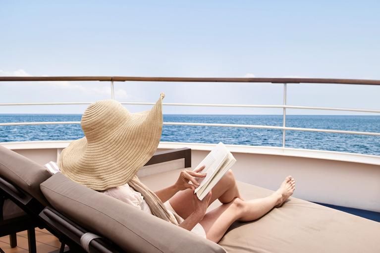 Reading on Deck, At Sea